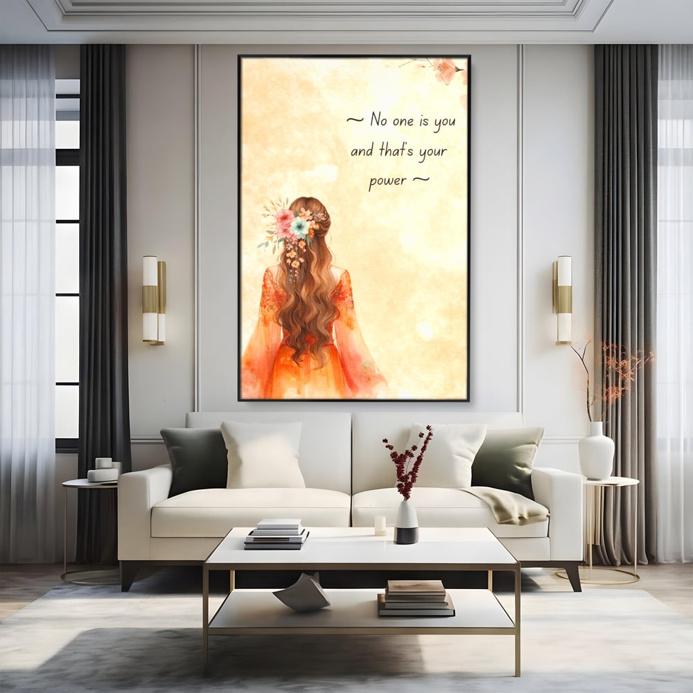 Tablou canvas cu tablou canvas cu femeie si flori, in rama de aluminiu negru, pe perete intr-un living